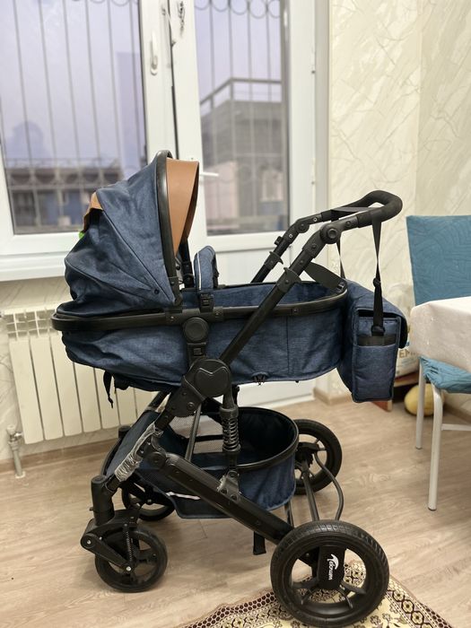 Коляска почти новая Teknum