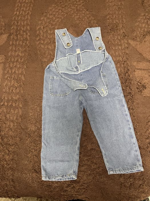 Продам джинсовый комбинезон