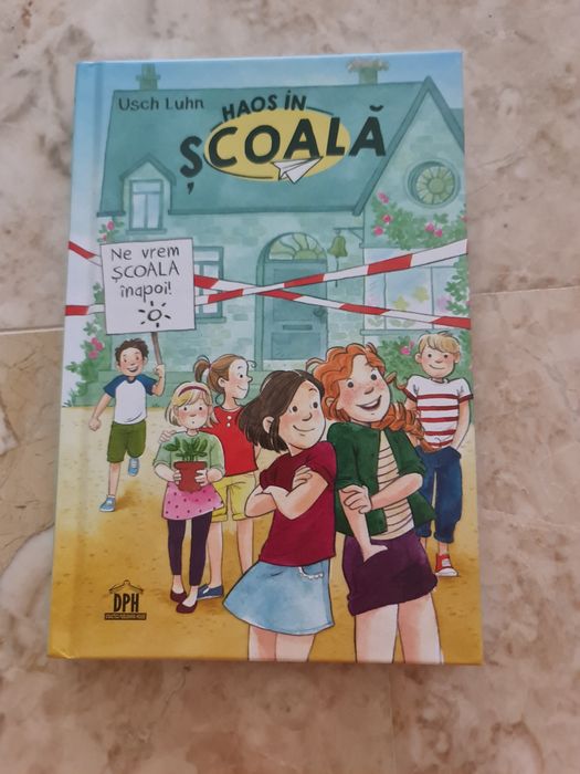 Haos  în  ṣcoala