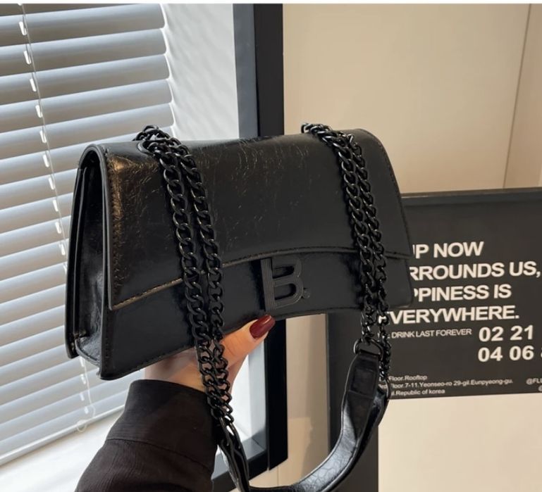 Женские сумки.