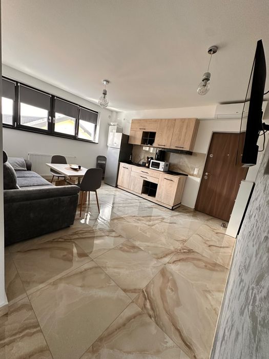 Apartament cu 2 camere , nou, mobilat, utilat , prima închiriere