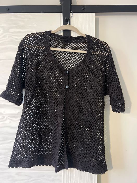 Плетени жилетки и шапки