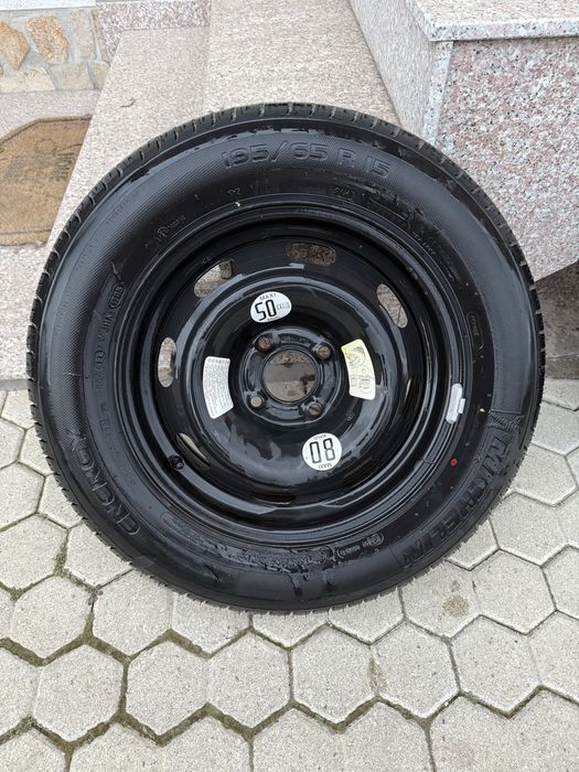 Резервна Гума + Нормална гума с джанта        (чисто нови са и двете)