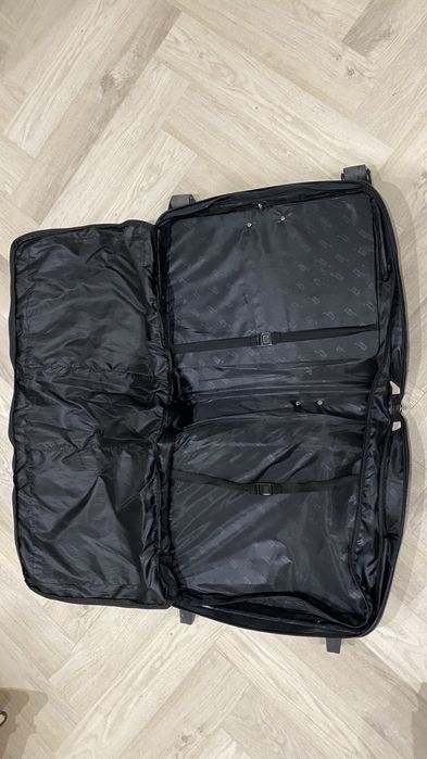 Дорожная кожаная сумка