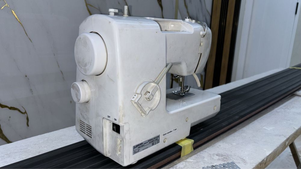 Швейная машина