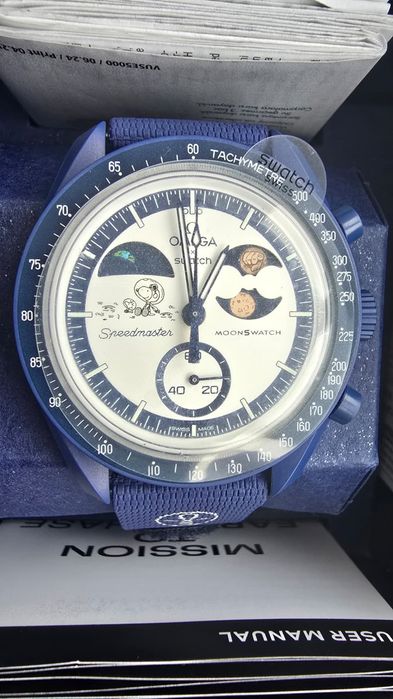 Swatch Omega Mission to Earthpase Moonshine Gold 
Ce