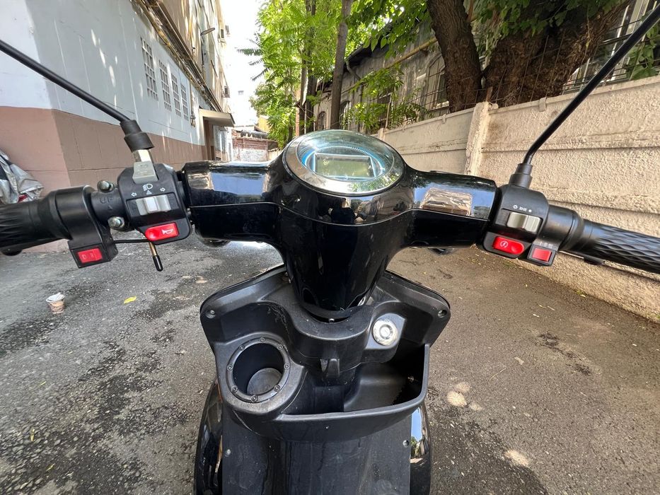 Scuter electruc pentru persoane cu dizabilitați