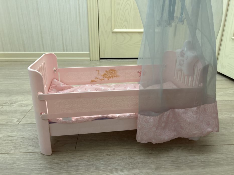 Игрушечная кроватка для кукол