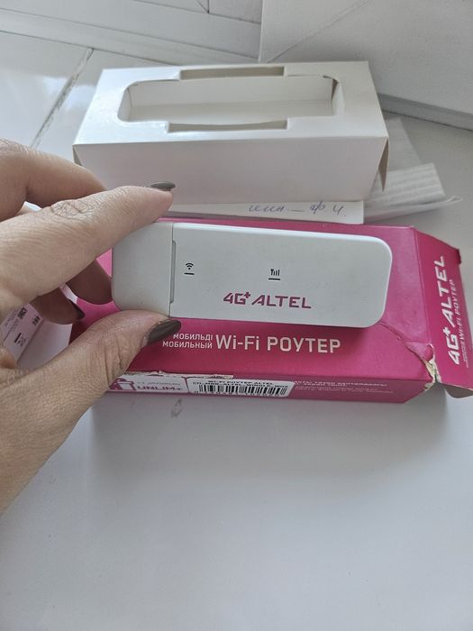 Продам наушники Samsung, модем Altel