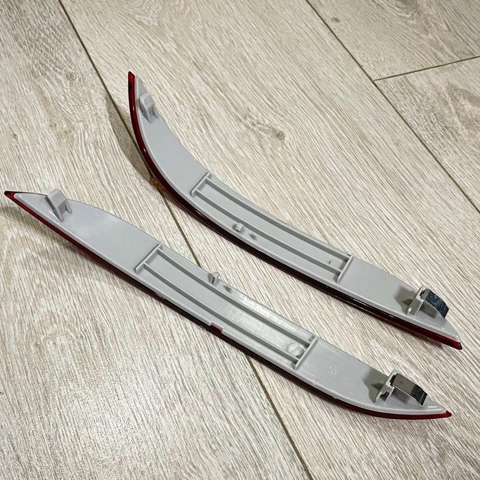 Отражатели (катафоты) заднего бампера BMW E60