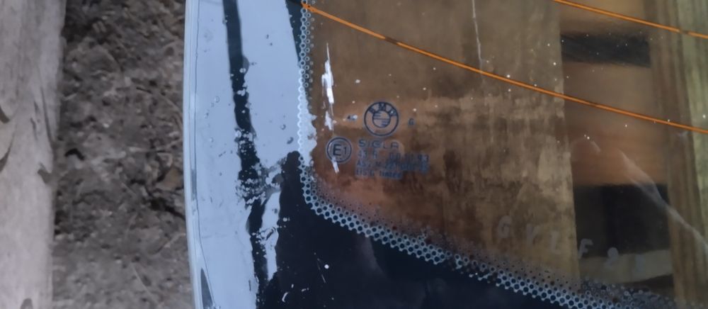 Продам заднее стекло е 34