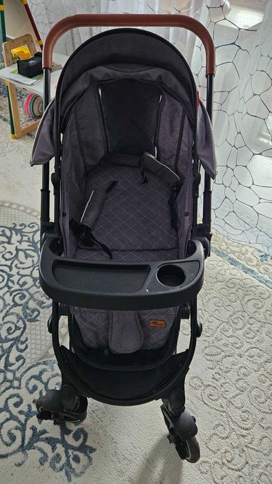 Детская прогулочная коляска