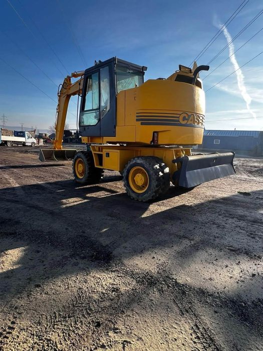 Excavator CASE 19,3t pe roti,  cu 6000 ore SCHIMB CU AUTO SAU 7-9 tone