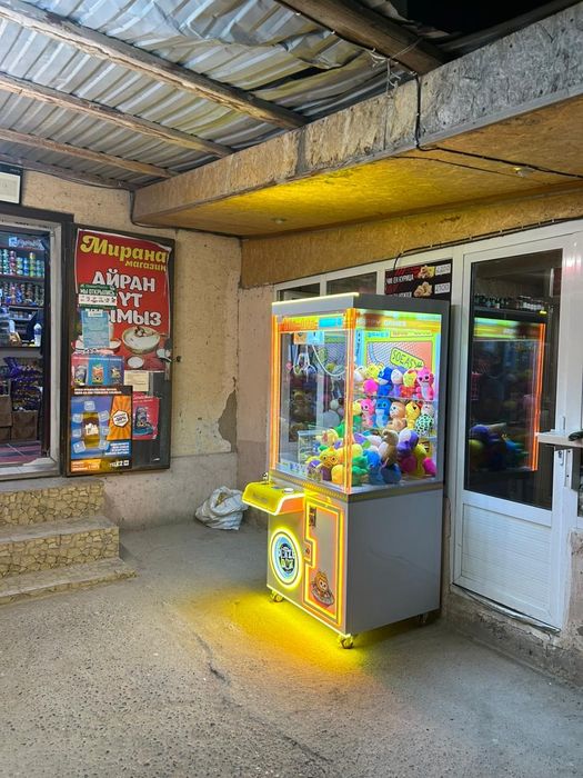 Игровой аппарат хватайка