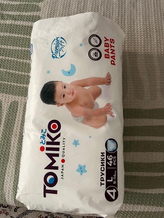 Продам памперсы томико