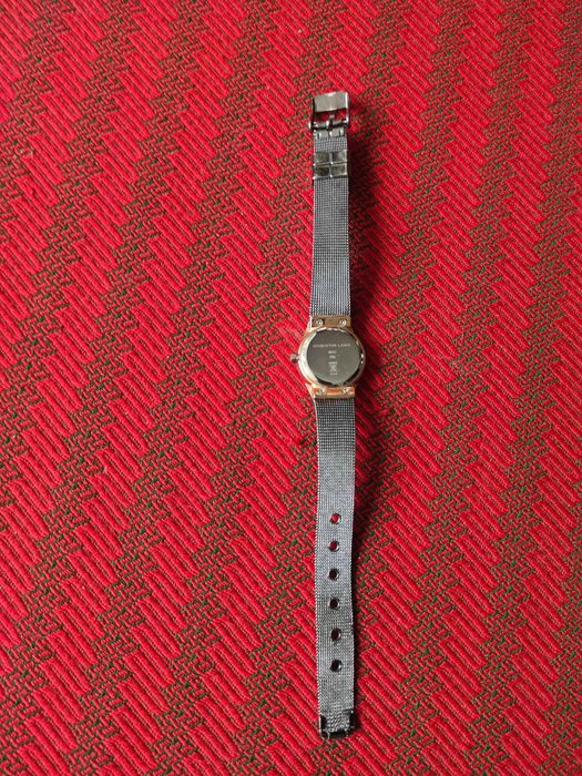 Ceas elegant de dama Christin Lars, cu afisaj analog. 
Are curea metal