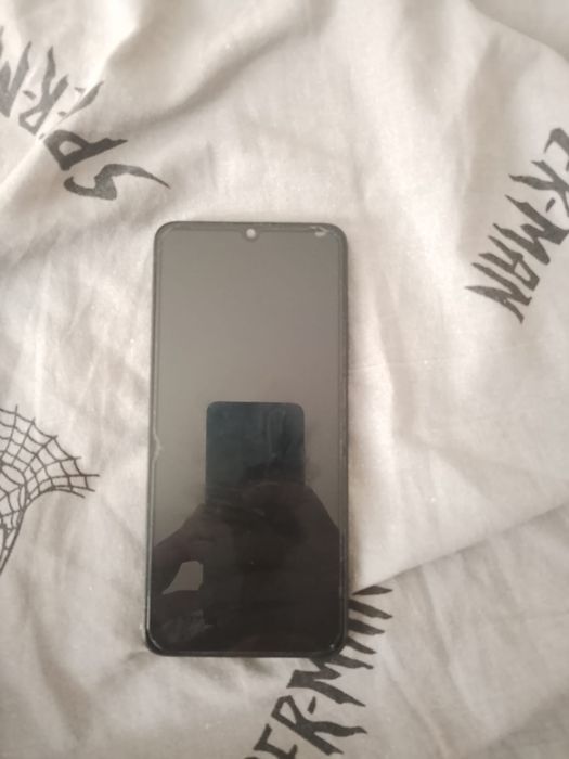 Redmi 13C телефон
