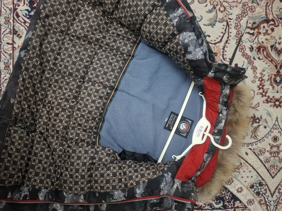 Куртка Пуховик почти новый