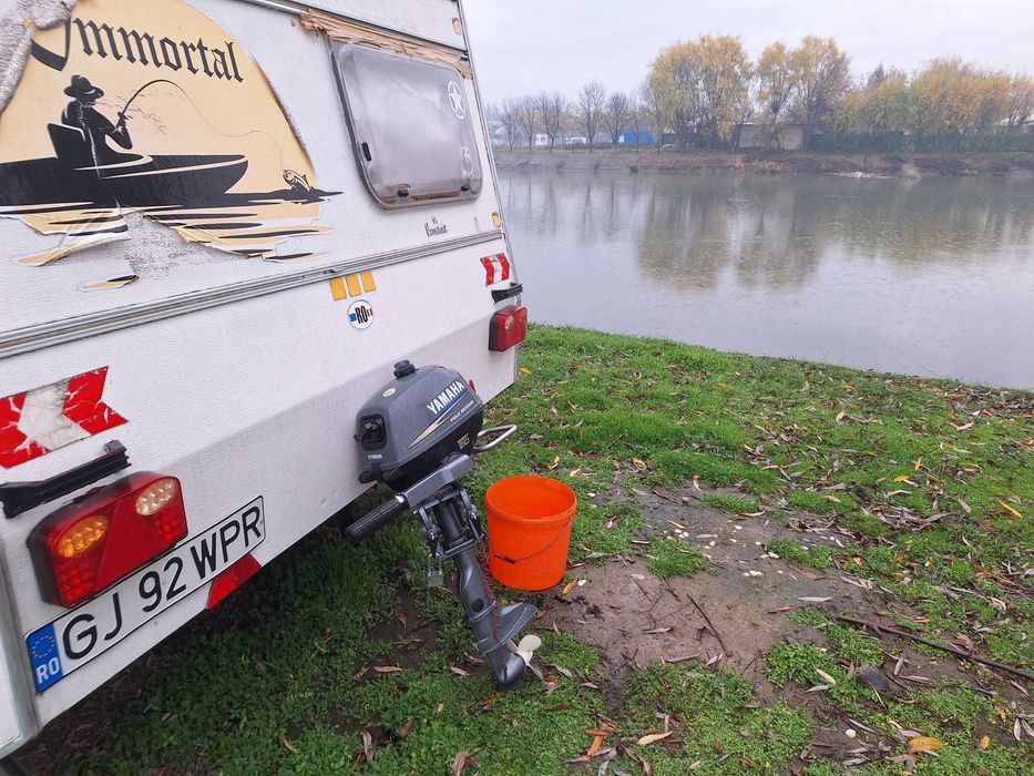 Motor Yamaha 2,5 HP 4 Timpi-Silențios perfect pentru bărci pneumatice.