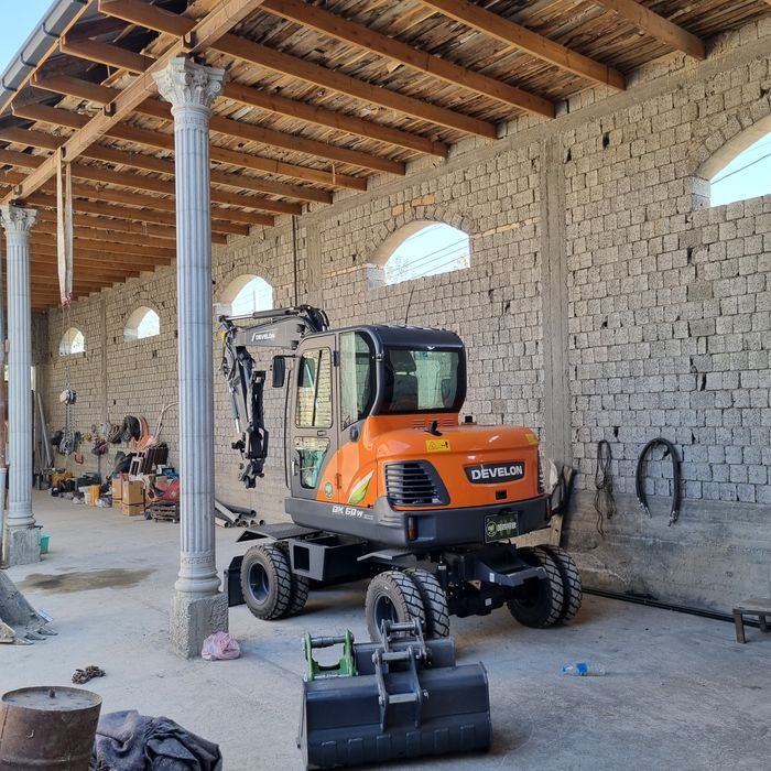 Экскаватор Develon DX60W eco 2025