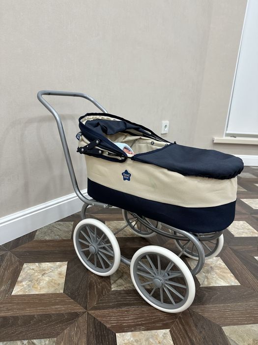 Игрушечная коляска