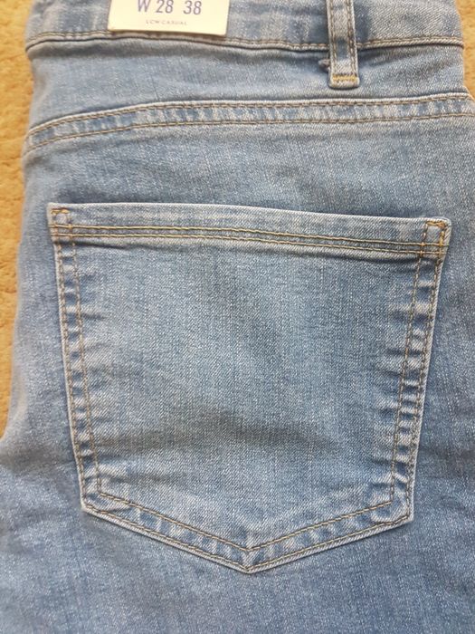 Джинсы новые голубые