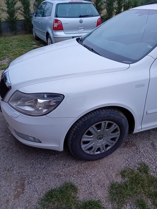 Aripa stanga skoda octavia 2 facelift 2009-2013