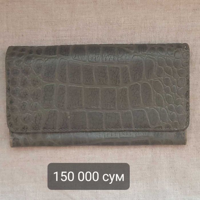 Kanishka кожаные сумки разных моделей.