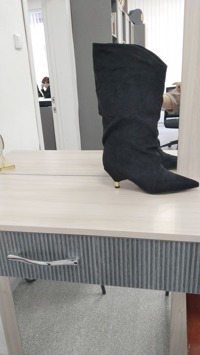 Продам новые сапоги