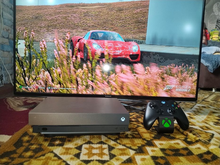 Продам xbox one x 1tb gold edition