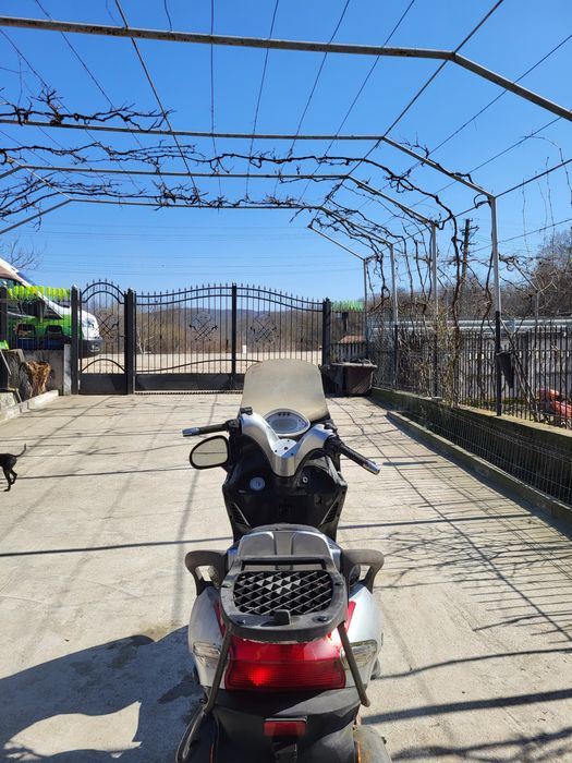 Vand sau schimb scuter kymco grand dink 250 cm