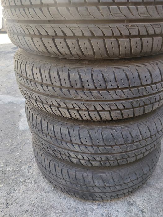 VW Polo  5×100-14" Жл.джанти с гуми+тасове