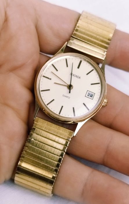 Ceas de damă Sekonda cu quartz, carcasă și curea din oțel inoxidabil.