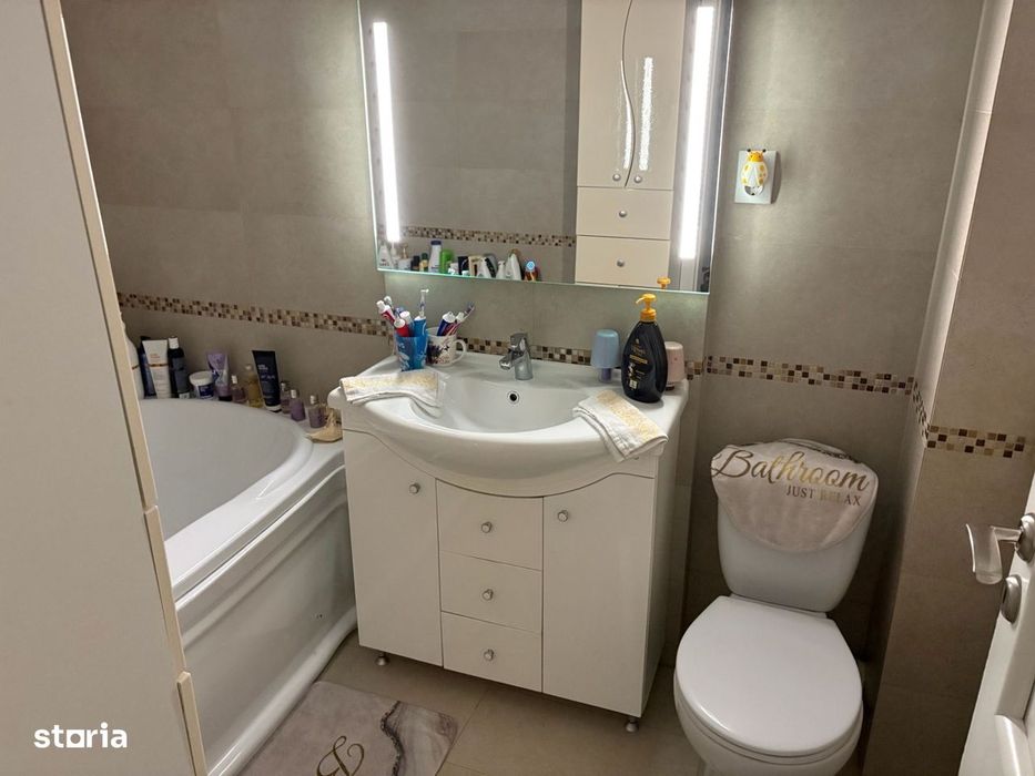 Apartament cu 3 camere,etaj 1,garaj de 30 mp
