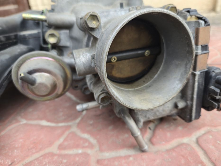 Коллектор с дроселем