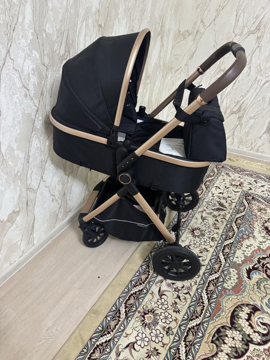 Kidilo brendiga oid bolalar kolyaskasi sotiladi.