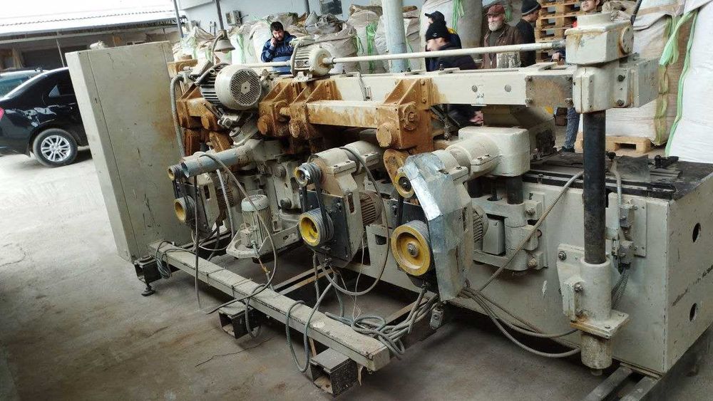 Четырёхсторонний продольно фрезерный станок