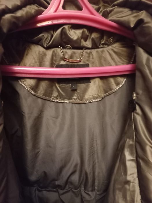 Продам Пуховик .