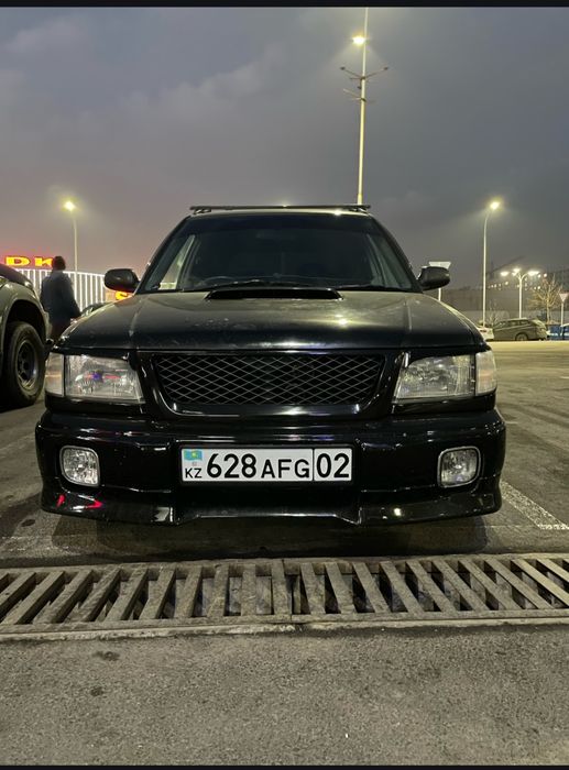 Бампер пороги сполер на Subaru Forester SF STI