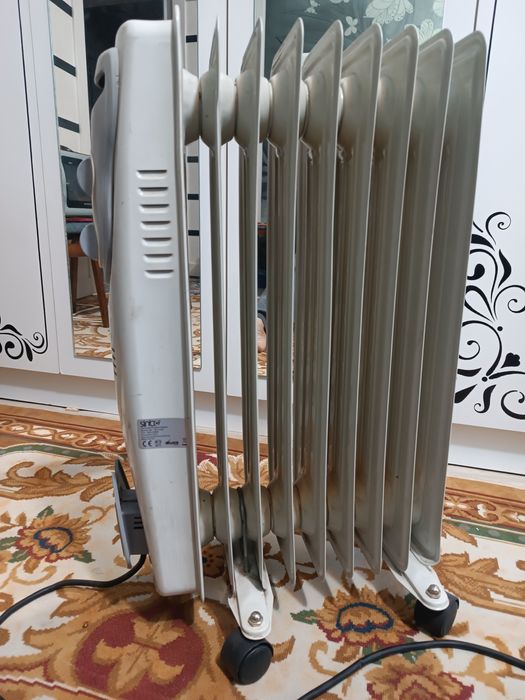 обогреватель  масляный  радиатор в отличном рабочем состоянии