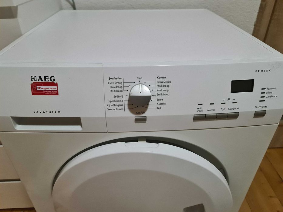 Икономична сушилня AEG (Термопомпа) – Дрехите излизат като изгладени!