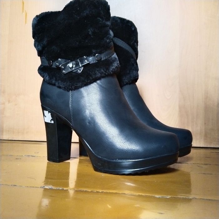 Новые женские сапоги