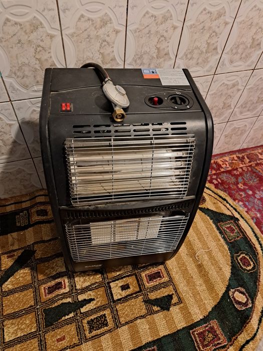 Vând soba pe gaz și electric