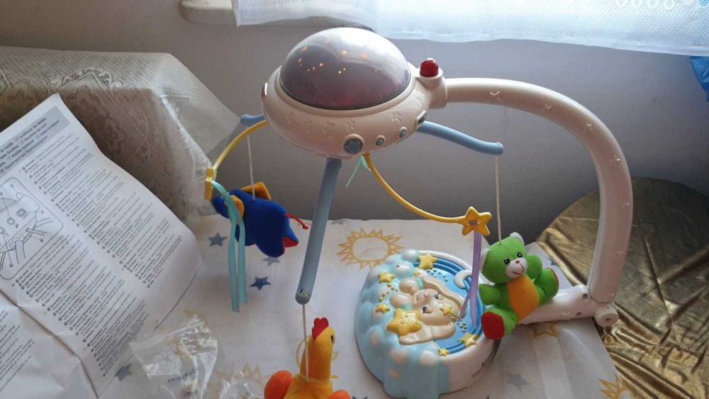 Carusel pentru bebe Fisher Price cu proiectie si telecomanda