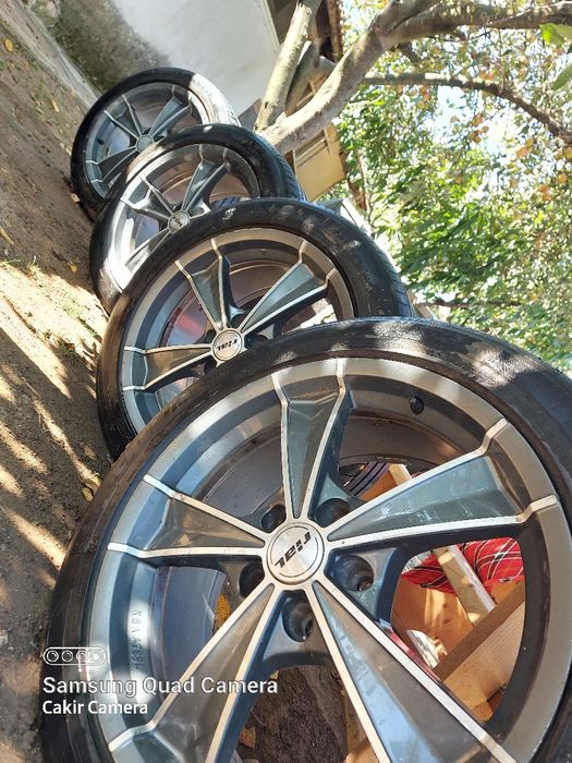 Джанти с гуми 5×112 -18