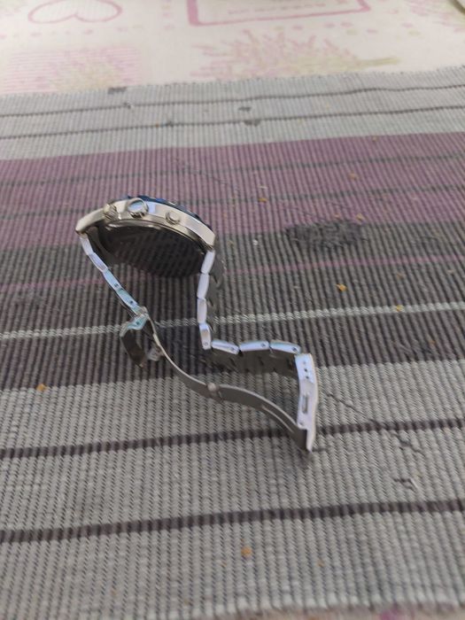 2 ceasuri barbatesti , unul Breitling si altul Slazenger