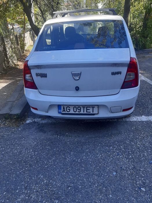 Vând Logan alb 13 impecabil