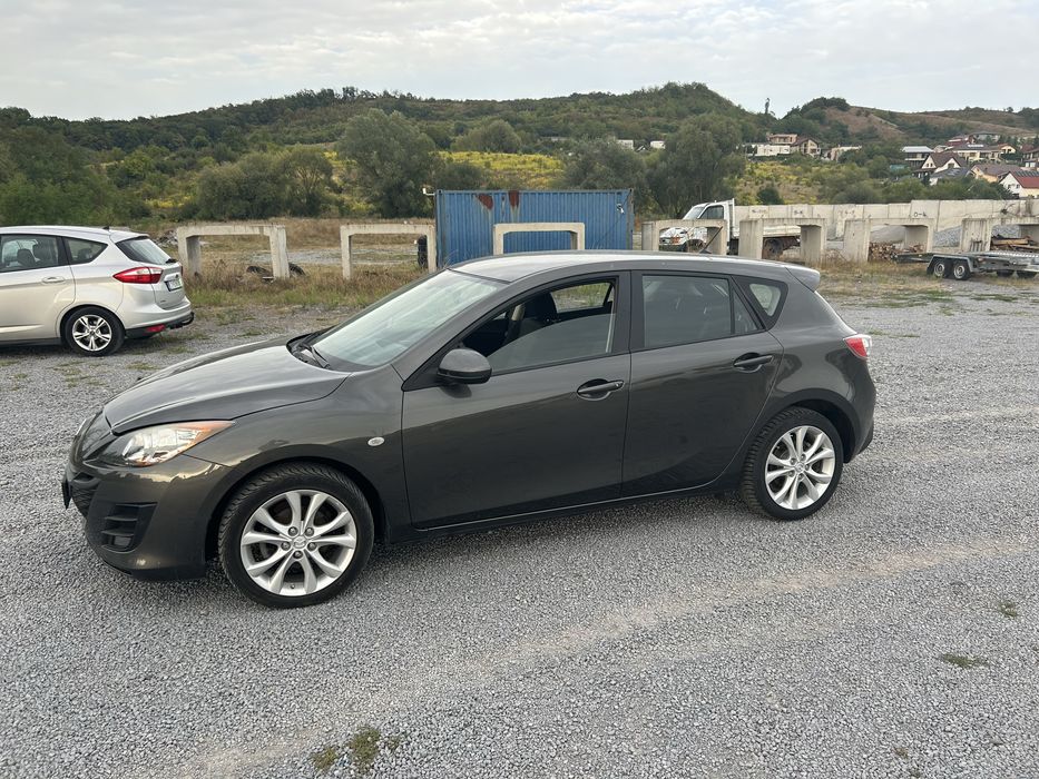 Mazda 3 1,6 benzina 105 cp 2010