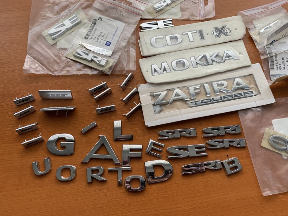 Sigla /Mokka/4X4/Sri/Elite/Emblema Bose/VW
