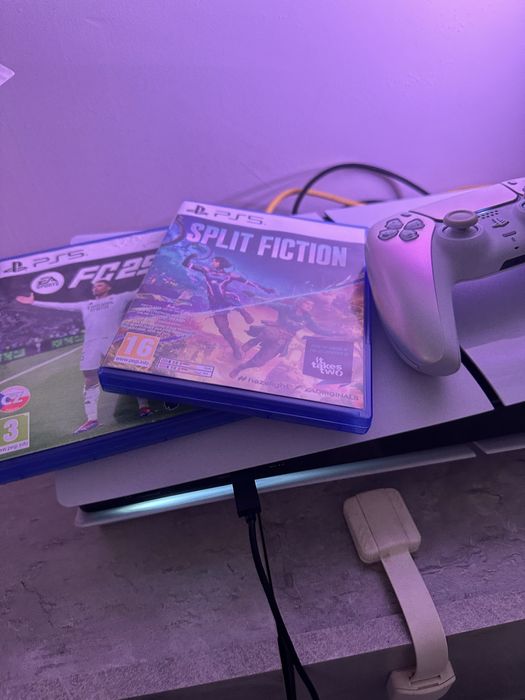 PlayStation 5 – 1TB + Manetă Pearl Chrome + Jocuri